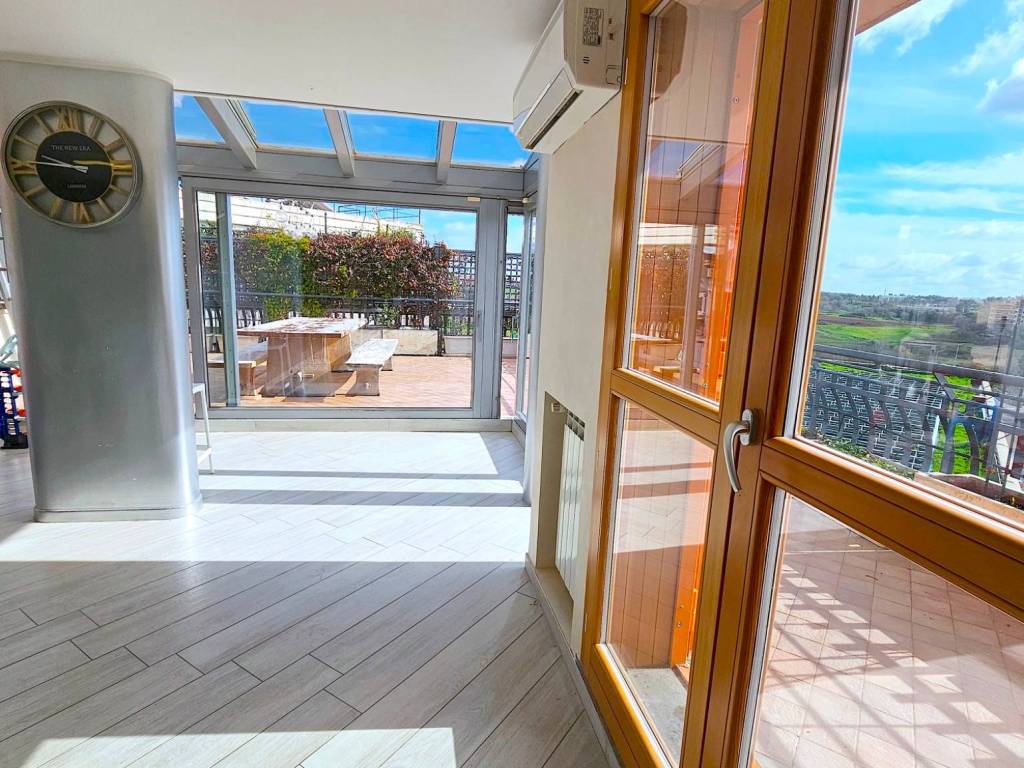 Attico / mansarda a Roma in Via Sorelle Radecchi, 28 - Foto 1